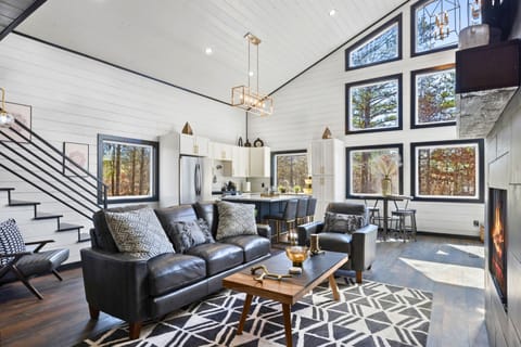 Our living room is designed to host memories, featuring spacious interiors that blend rustic charm with contemporary elegance, ideal for family gatherings or quiet evenings.