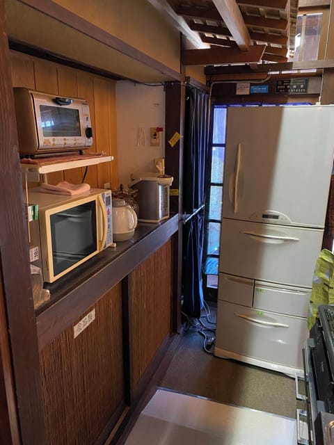 Fridge, microwave, stovetop, cookware/dishes/utensils