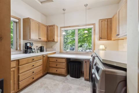 Large laundry room with plenty of storage!
