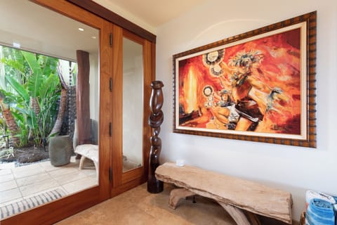 Front entry to the home with lovely traditional artwork