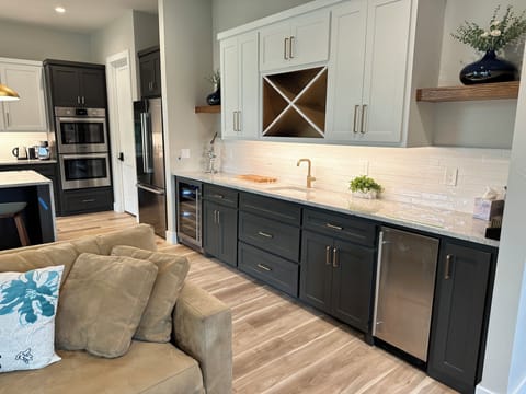 Full wet bar, with wine fridge and ice maker.