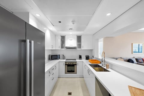Kitchen Delight: Modern appliances and sleek design await your culinary adventures!