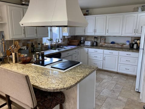 Our open concept ensures chef will have company while pulling together meals.