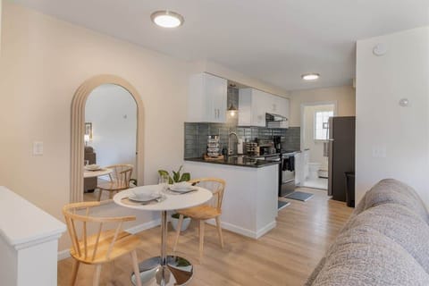 Sleek modern kitchen with classic touches, designed for both style and functionality.