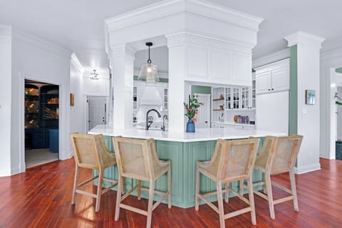 The kitchen is located behind the seating area