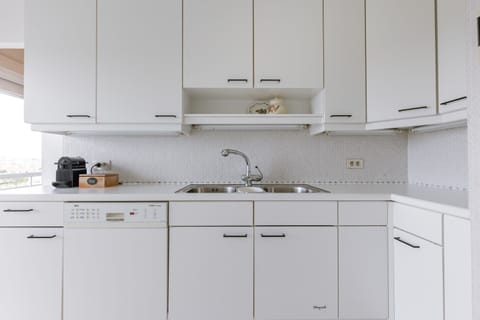 Kitchen with coffee machine