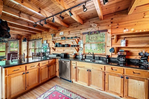 The kitchen is fully stocked and includes silverware, dishware, bakeware, utensils, and more.