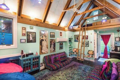 This is the primary sleeping area with an additional futon up in the loft, linens are provided. Lots of blankets, pillows, and sheets. Whatever you might need it is available. 