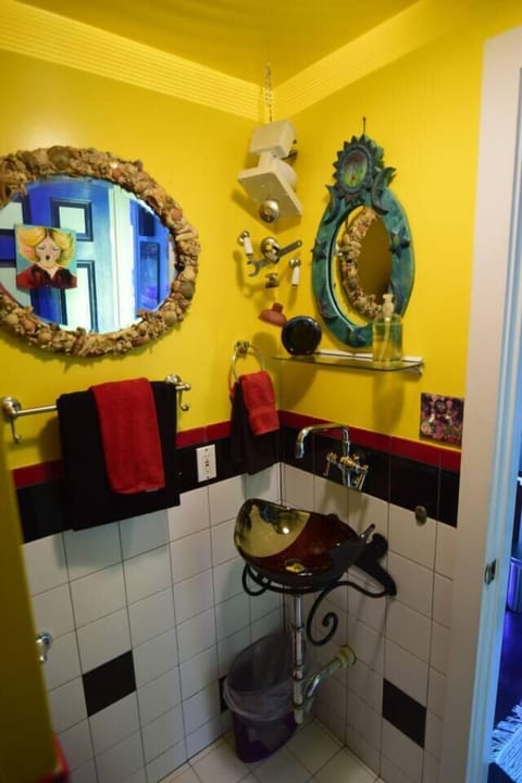 Although the bathroom is tiny, it is chock full of fresh towels and amenities that include hand soap, hair products, hair dryer, and body wash. No need to bring your own.