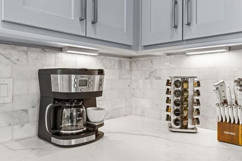 The coffee maker will make a full pot and also uses K-cups for a single cup! We provide enough coffee grounds and k-cups to get you started! Feel free to bring more from home or stop at the store!