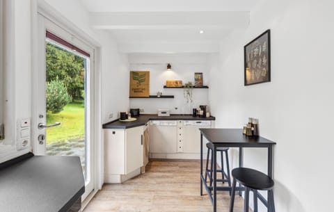 Fridge, stovetop, dishwasher, coffee/tea maker