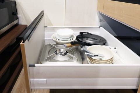 Fridge, microwave, stovetop, cookware/dishes/utensils