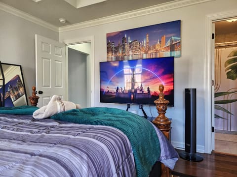 65" Roku TV and private bathroom.