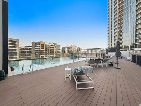 Rooftop Pool Oasis: Dive into relaxation with stunning views and sun-soaked loungers!