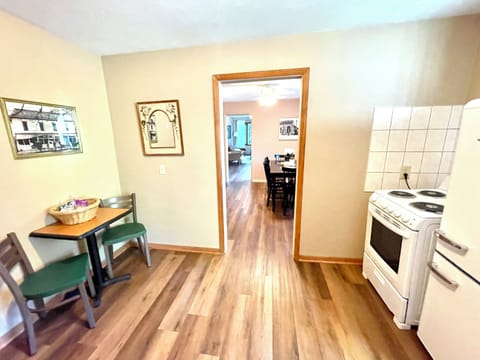 Open concept floor between kitchen, dining room, and living room.