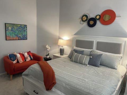 Master Bedroom with King size bed and small
sofa