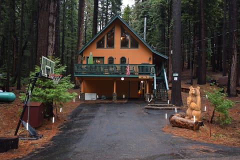 Front of Daves Den, Theodor the Bear on the right