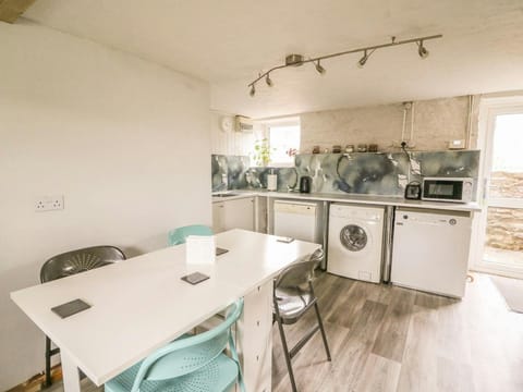 Dining table and chairs, washing machine and dishwasher