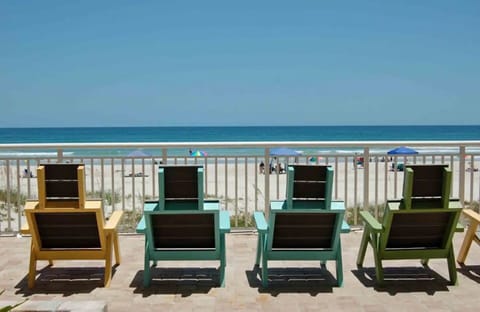 On the beach, sun loungers, beach towels