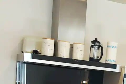 Kitchen with cooking hobs, free tea bags, coffee, electric kettle, cafeteria