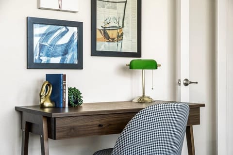 Office has a desk and chair