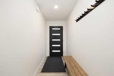 Main Level: Entry w/ bench & coat rack