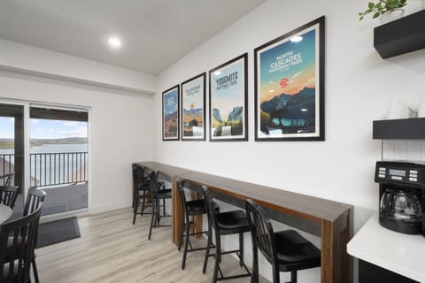 Main Level: Dining room w/ seating for 10 at dining table & seating 9 seatings at bar counters