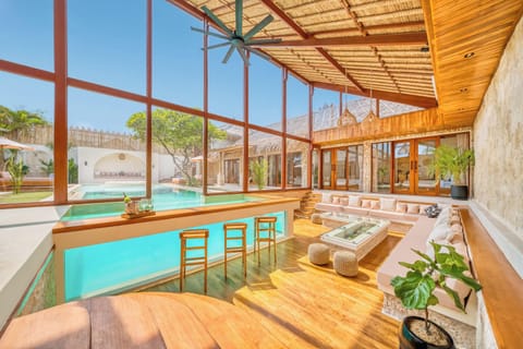 Enjoy your cocktails by the pool with the luxury of your living room