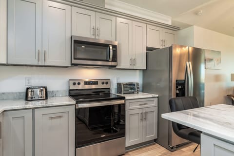 007 Blue Heaven Fully Equipped Kitchen Stove and Microwave