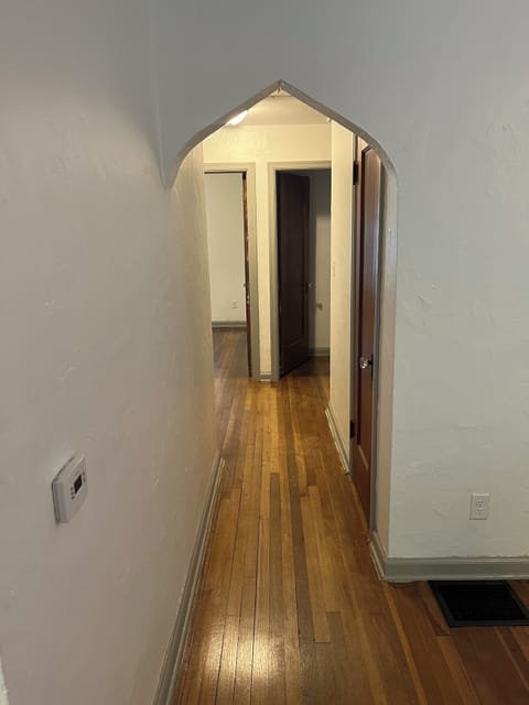Hallway to bedrooms and bathroom