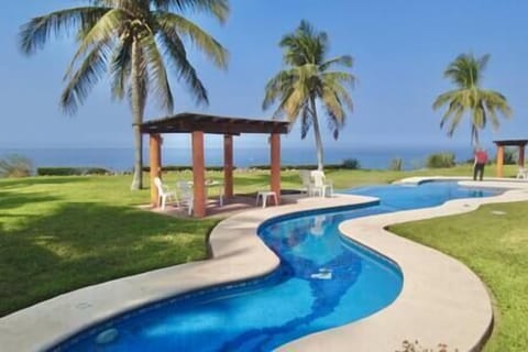 shared pool with ocean view in the background