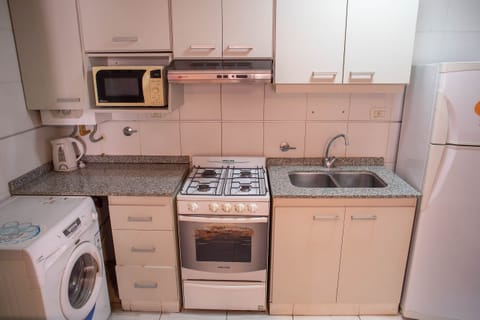 Fridge, microwave, oven, cookware/dishes/utensils