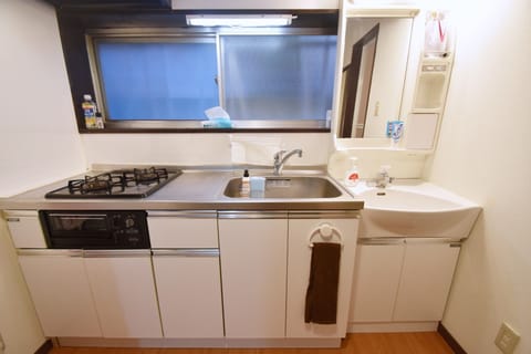 Fridge, microwave, stovetop, cookware/dishes/utensils