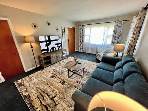 Spacious living room with smart tv