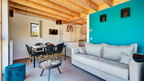 Sink into the cozy sofa after a day exploring the area.