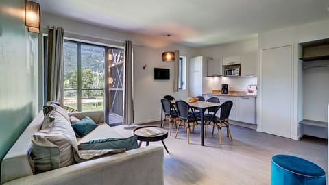 Sink into the cozy sofa after a day exploring the area.