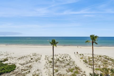 On the beach, sun loungers, beach towels