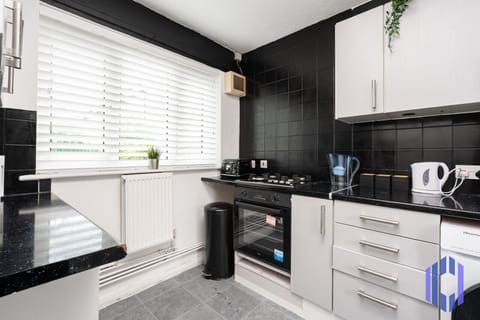 Kitchen. Fully equipped with cooking equipment perfect for families. Appliances such as fridge freezer, microwave, cooker, oven, dishwasher Toaster are free and available for your use.