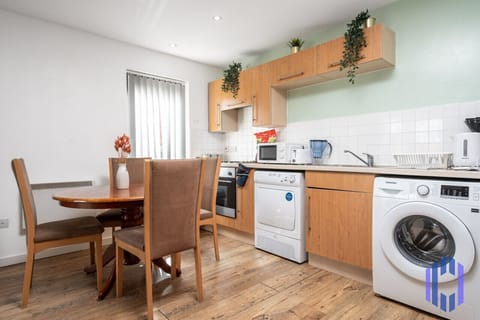 Kitchen/diner. Fully equipped with cooking equipment perfect for families. Appliances such as washer, fridge freezer, microwave,  oven are free and available for your use.