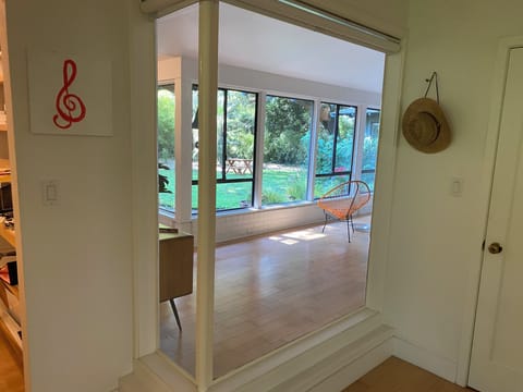 View from master through interior window to backyard