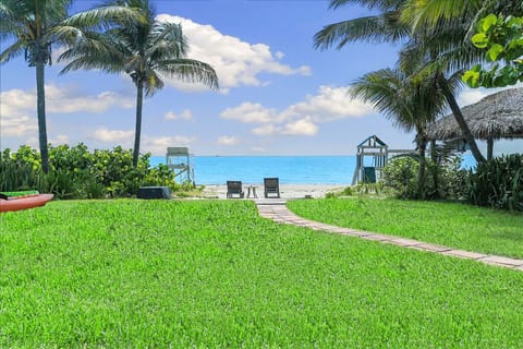 On the beach, sun loungers, beach towels