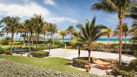 On the beach, sun loungers, beach towels