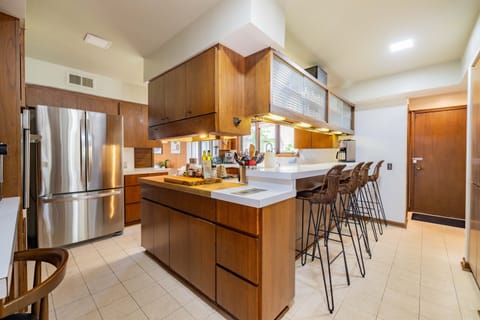 A spacious, gourmet kitchen that’s perfect for preparing meals or enjoying casual snacks.