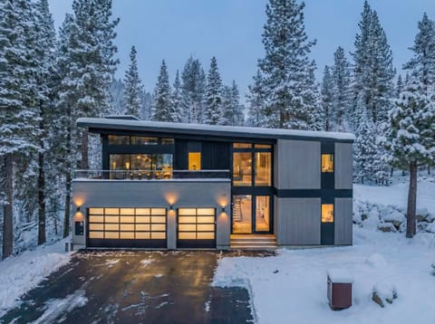 Exterior: Front view of this luxury home, upper deck, garage, located 4 minutes from Palisades Tahoe and 7 minutes to Alpine Meadows and Tahoe City.
