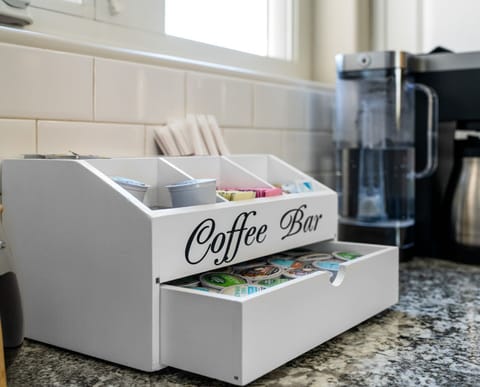 "Start your day refreshed with a personalized brew from our chic Coffee Bar—a cozy touch to your stay at Irvie Homes, where comfort meets convenience. #VacationRental #HomeAmenities #MorningCoffee"