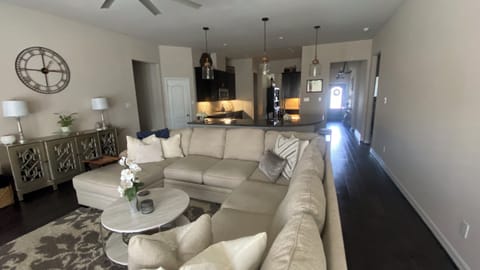 Large family room with oversized sectional and chaise