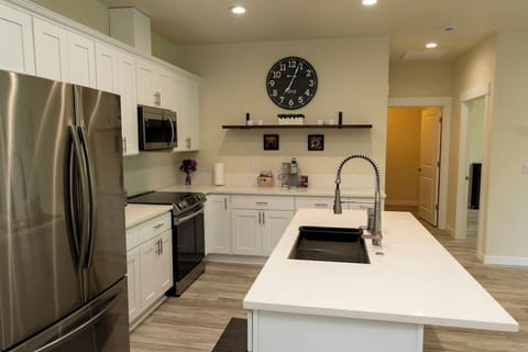 Full Kitchen with basic cooking supplies.