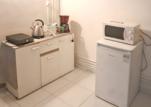 Fridge, microwave, coffee/tea maker, toaster