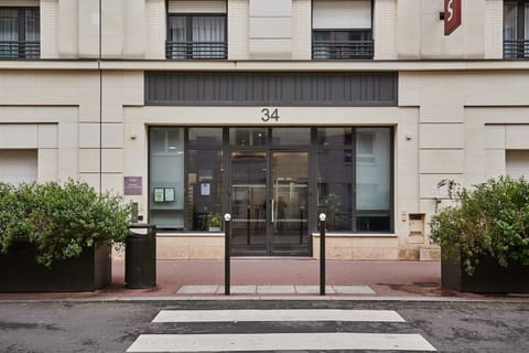 Welcoming main entrance located just a short walk from shops and public transit.