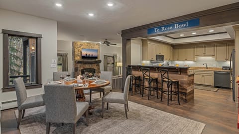 Guest apartment on the middle (3rd) level with dining area, kitchen, and breakfast bar